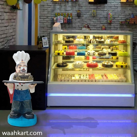 Waiter Statue With Chocolate Cake