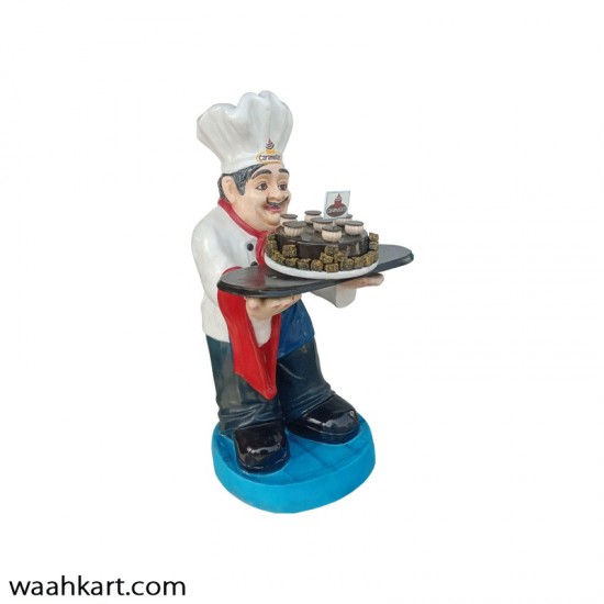 Waiter Statue With Chocolate Cake