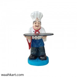 Waiter Statue With Chocolate Cake