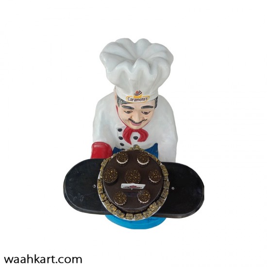 Waiter Statue With Chocolate Cake