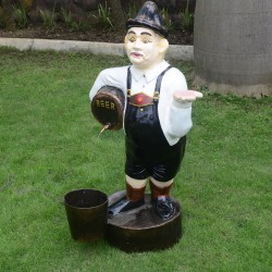Man with beer barrel fountain