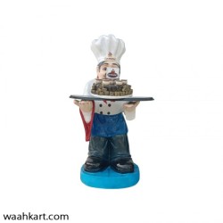 Waiter Statue With Chocolate Cake