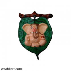 Traditional Lord Ganesha On Green Leaf
